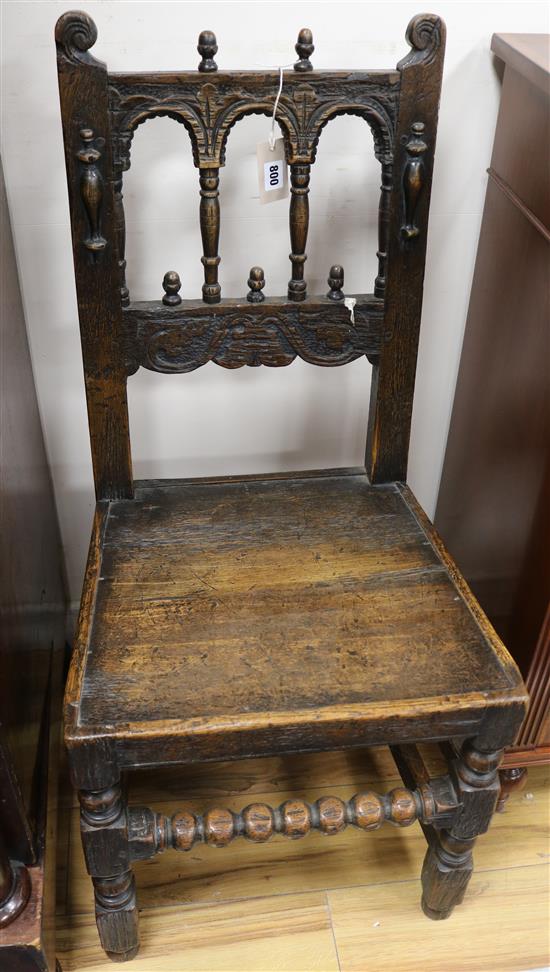 A 17th century Derbyshire wood seat dining chair, with bobbin turned underframe